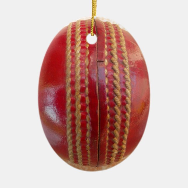 Crimson Stitch Focus: Close-Up of Cricket's Heart Ceramic Ornament (Front)