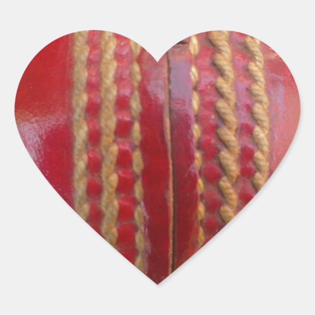 Crimson Stitch Focus: Close-Up of Cricket's Heart Sticker (Front)