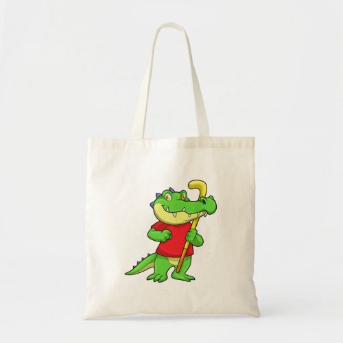 Crocodile at Field hockey with Stick Tote Bag