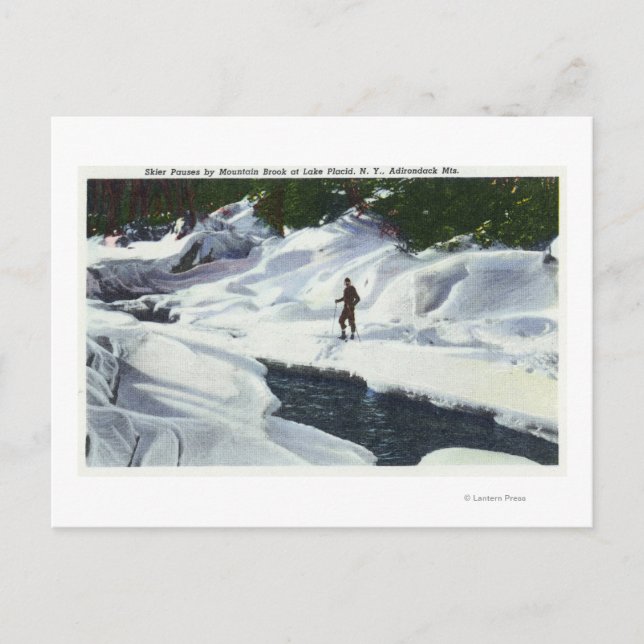Cross-Country Skier Pauses by Mountain Brook Postcard (Front)