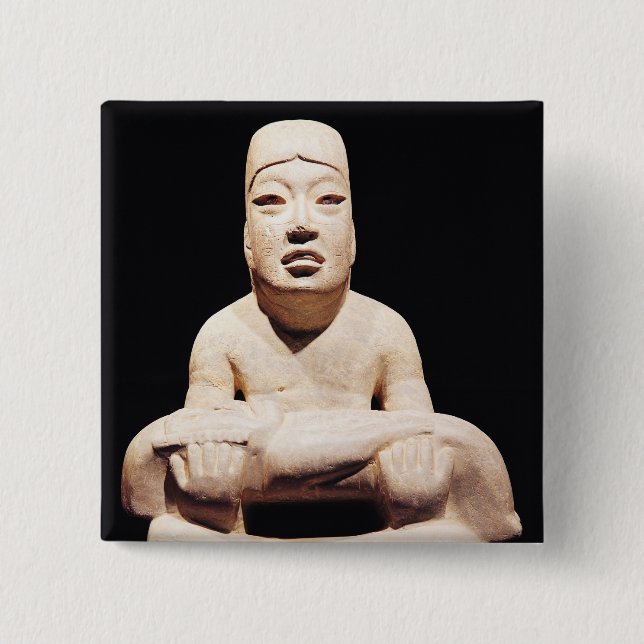 Cross-legged figure holding a baby, Olmec Button (Front)
