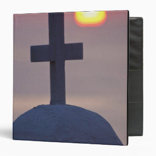 Cross on top of church at sunset, Mykonos, Binder
