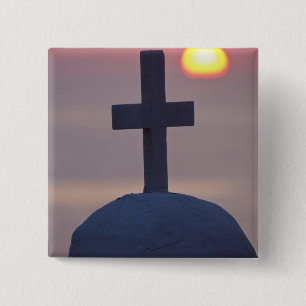 Cross on top of church at sunset, Mykonos, Button