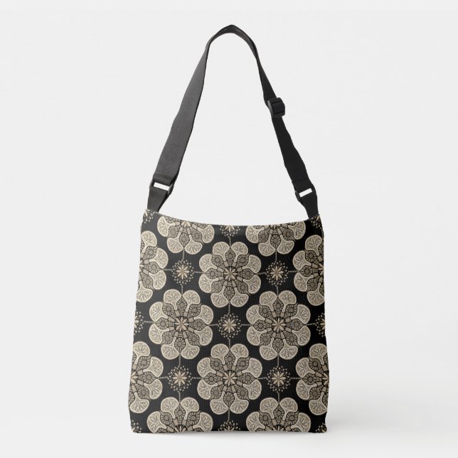 Crossbody bag with tan medallions on black (Front)
