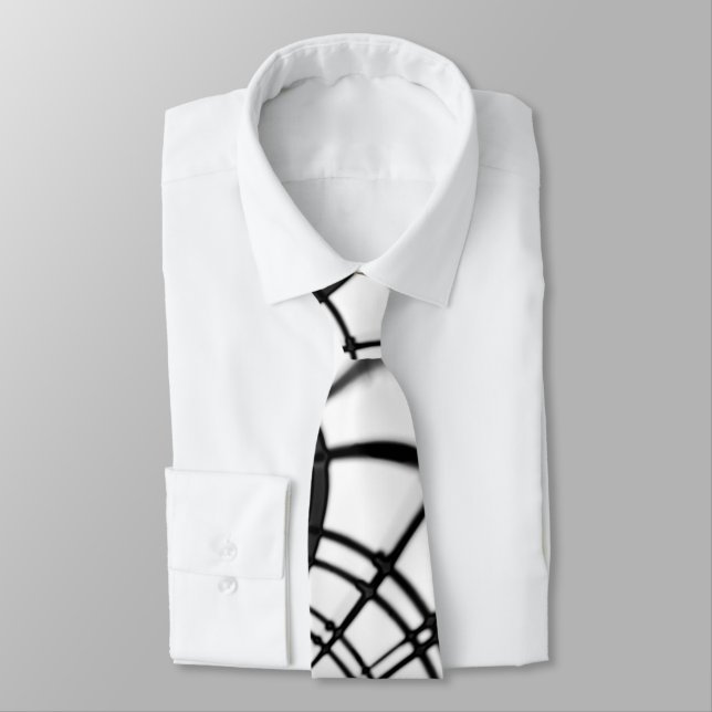 Crossed grey lines remind us of drawings of claw neck tie (Tied)