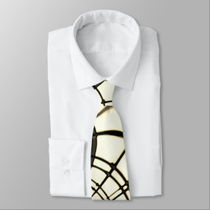 Crossed nut-brown or khaki curved traces up beige neck tie