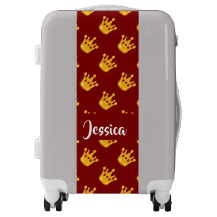 Crowns on red luggage