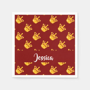 Crowns on red napkins