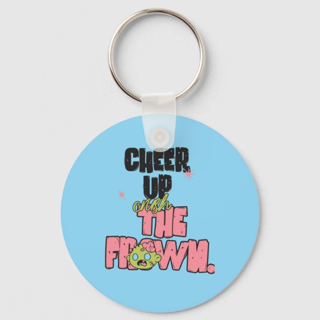 CRUSH THE FROWN CHEER UP ROUND METAL KEYCHAIN  (Front)