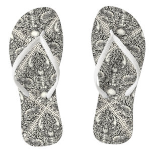 Crustacean in black and natural white flip flops