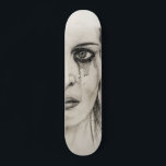 Crying girl - Drawing in pencil Skateboard<br><div class="desc">On a recent trip home,  I went into the attic and found some art I drew years ago. This picture of a woman crying is the last piece I drew before I created my Bull Elephant piece 20 years later. It is dated 03/04/1998. I really like this piece.</div>