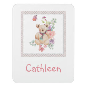 Cuddly teddy in flowers door sign