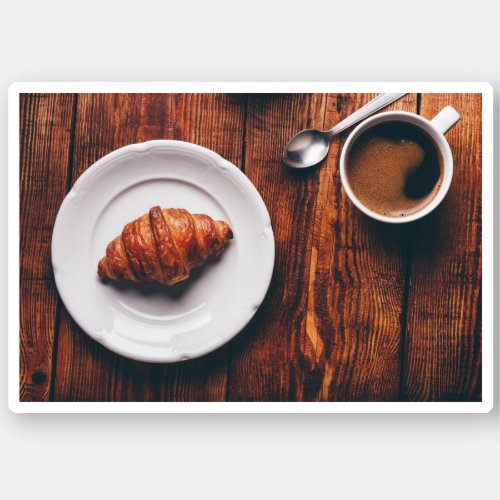 Cup of Coffee And Croissant on Rustic Table Sticker