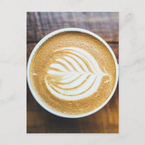 Cup of Coffee Latte with Leaf_Shape Foam on Wood Postcard