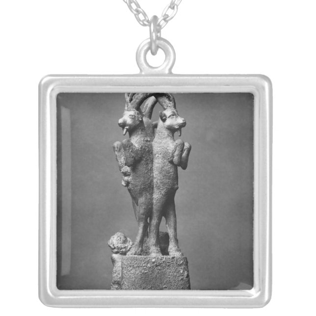 Cup stand made up of three ibexes silver plated necklace (Front)