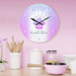 Cupcake Bakery Pastry Chef Purple Glitter Drips Large Clock<br><div class="desc">Make a stylish impression with this elegant, sophisticated, simple, and modern custom name wall clock. A sparkly, purple, pink, blue cupcake, script handwritten typography and glitter drips overlay a faux metallic champagne purple blue ombre background. Personalize with your full name, business, or other info. Your choice of a round or...</div>