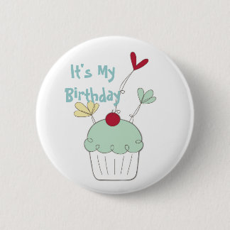 Cupcake birthday badge with cherry and flowers button