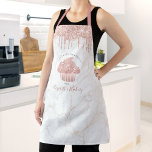 Cupcake Rose Gold Glitter Drips Marble Bakery Chef Apron<br><div class="desc">Here’s a wonderful way to add to the fun of baking. Add extra sparkle to your culinary adventures whenever you wear this elegant, sophisticated, simple, and modern apron. A sparkly, rose gold cupcake, glitter drips, and handwritten typography overlay a white marble gold veined background. Personalize with your name or other...</div>