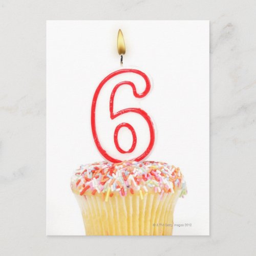Cupcake with a numbered birthday candle 4 postcard