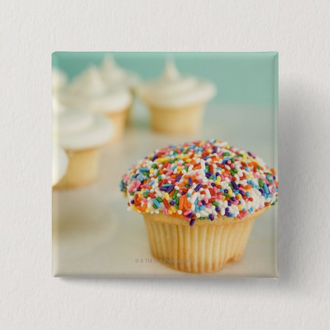 Cupcakes, focus on one in front with pinback button (Front)