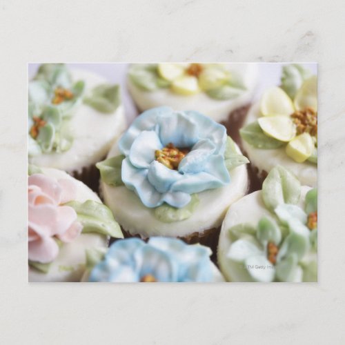 Cupcakes with flower icing postcard