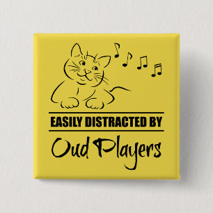 Curious Cat Easily Distracted by Oud Players Button