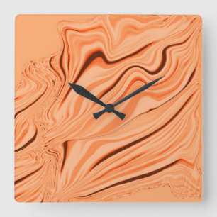 Curlings in tones of orange, curved brown cylinder square wall clock