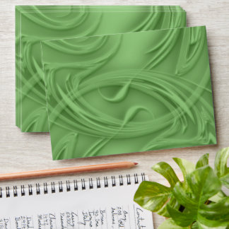 Curls Over Green Envelope