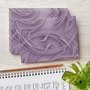 Curls Over Purple Envelope