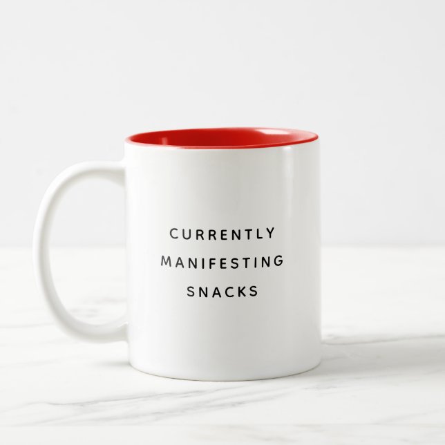 Currently Manifesting Snacks Happy Humorous Mug (Left)