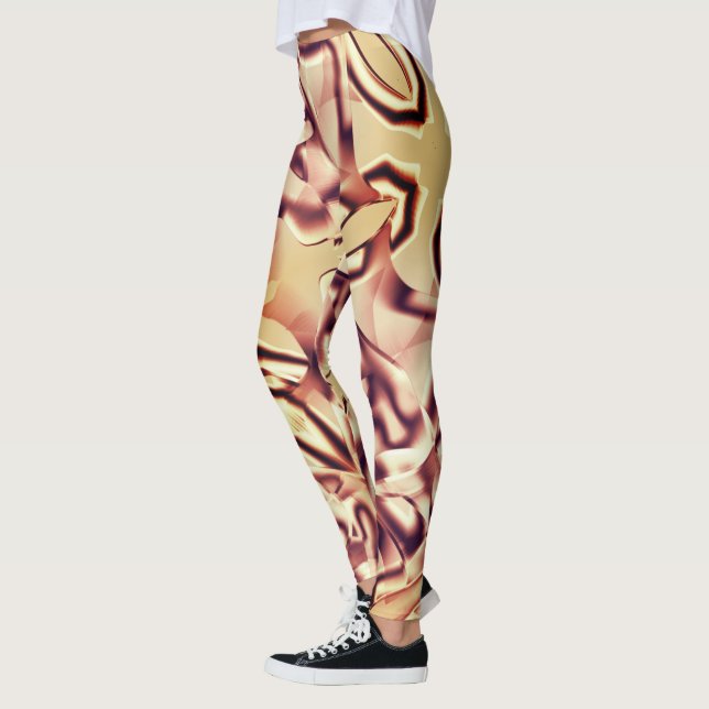 Curved brownish red or burgundy shapes, beige tone leggings (Left)