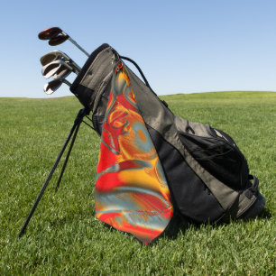 Curved staines in scratched orange to red on gray golf towel