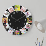 Custom 12 Photo Collage Black Round Large Clock<br><div class="desc">Personalized photo clock with your own custom photos. The photo template is set up ready for you to add 12 of your favorite pictures working clockwise from the top. This smart black design has white numbers and will look great with modern and contemporary decor. For this design, square instagram photos...</div>