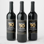 Custom 90th Birthday Wine Label<br><div class="desc">Custom elegant 90th birthday party wine bottle labels featuring a stylish black background that can be changed to any color,  gold sparkly glitter,  ninety gold hellium balloons,  and a modern text template that is easy to personalize.</div>