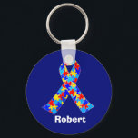 Custom Autism Awareness Ribbon Keychain<br><div class="desc">Custom Autism awareness ribbon keychain for autistic friends or family. A cool proud autism mom or dad gift that can be personalized with any text below the puzzle piece ribbon of blue,  yellow,  and red. A neat Asperger Syndrome pride present.</div>