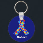 Custom Autism Awareness Ribbon Keychain<br><div class="desc">Custom Autism awareness ribbon keychain for autistic friends or family. A cool proud autism mom or dad gift that can be personalized with any text below the puzzle piece ribbon of blue,  yellow,  and red. A neat Asperger Syndrome pride present.</div>