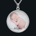 Custom, baby photo, blessed script sterling silver necklace<br><div class="desc">Set a favorite photo of your baby within this pendant. The word "blessed" in an elegant script is placed at the bottom to remind you of this special word and loved child. A wonderful gift.</div>
