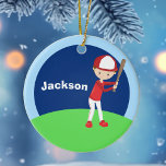 Custom Baseball Kid Ceramic Ornament<br><div class="desc">Cool customized baseball player ornament for a child who plays Little League or T Ball. This cute Christmas gift features a kid wearing a red baseball uniform and holding a bat against a blue background on a green field. Personalize by adding a name in white on the blue sky.</div>