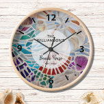 Custom Beach House  Clock<br><div class="desc">This beach house clock is decorated with a unique mosaic shell design. Easily customizable with your family name and date. Makes a perfect house warming gift. Use the Customize Further option to change the text size, style, or color if you wish. Because we create our artwork you won't find this...</div>