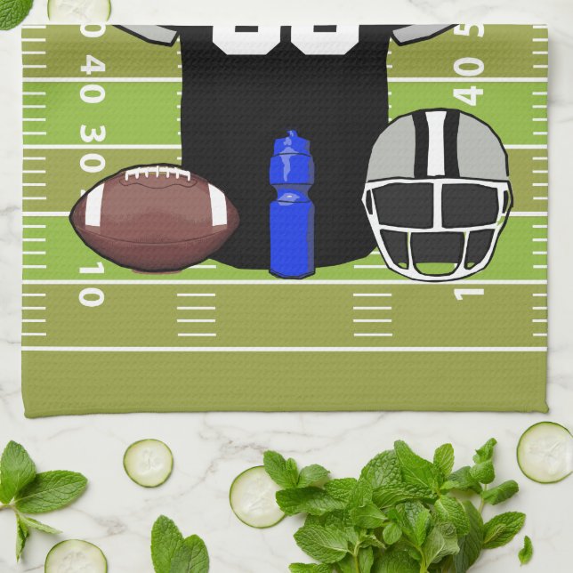 Custom Black and Gray Football Jersey on Field Towel (Folded)