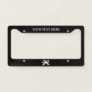 Custom black car license plate frame with bow logo