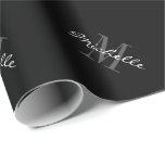 Custom black monogram Christmas wrapping paper<br><div class="desc">Personalized monogram Christmas wrapping paper. Monogrammed wrappingpaper with elegant typography. Add your own name initial letter and colors. Black and white Xmas Holiday giftwrap. Chic design for men women and kids. Available in matte and glossy rolls. Stylish DIY packaging accessories and wrapping supplies. Also nice for Birthday, wedding party, anniversary,...</div>