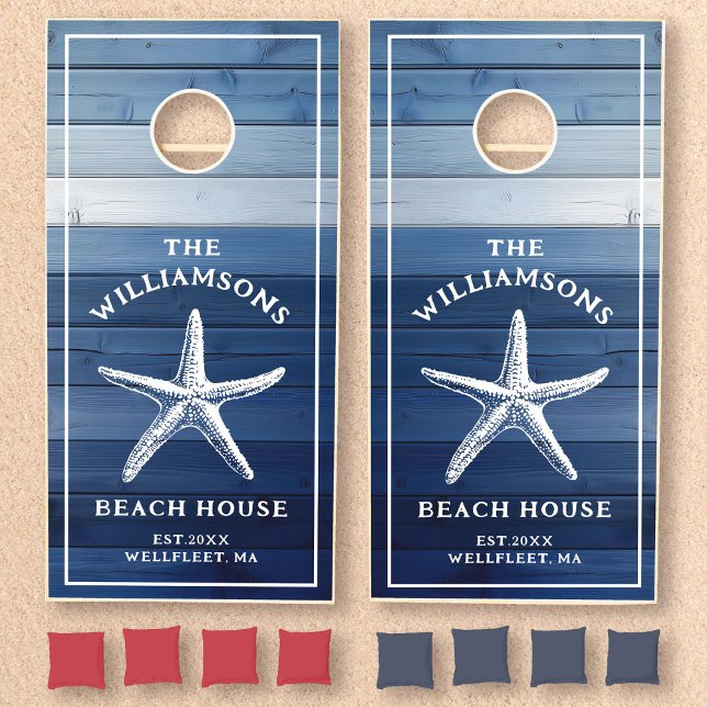 Custom Blue Coastal Starfish Beach House Cornhole Set (Two blue woodgrain cornhole boards feature a white starfish with custom text )