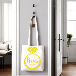 Custom bride sparkling diamond ring tote bag<br><div class="desc">Bride Tote Bag, the perfect accessory for any bachelorette party. This stylish and practical tote bag is designed to cater to the needs of the bride-to-be, providing ample space to carry all her essentials for the big night out. Crafted from high-quality materials, this tote bag boasts a durable construction that...</div>