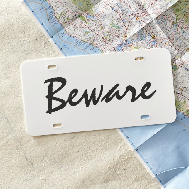 Custom Car License Plate - Beware White Black (In Situ)