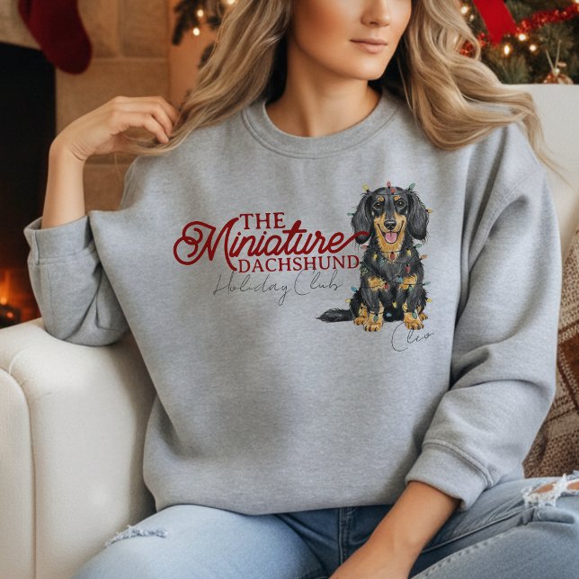 Custom Christmas Holiday Club Miniature Dachshund Sweatshirt (Elevate your holiday shopping apparel with this Custom Christmas Miniature Dachshund sweatshirt!)