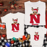 Custom Christmas Monogram With Name Funny Pajama T-Shirt<br><div class="desc">Introducing our Custom Christmas Monogram With Name Funny Pajama White T-Shirt – the perfect addition to your festive family celebrations! Elevate your holiday spirit with these personalized shirts designed to bring joy and unity to your family gatherings. Featuring a charming monogram with custom names, these shirts add a playful and...</div>