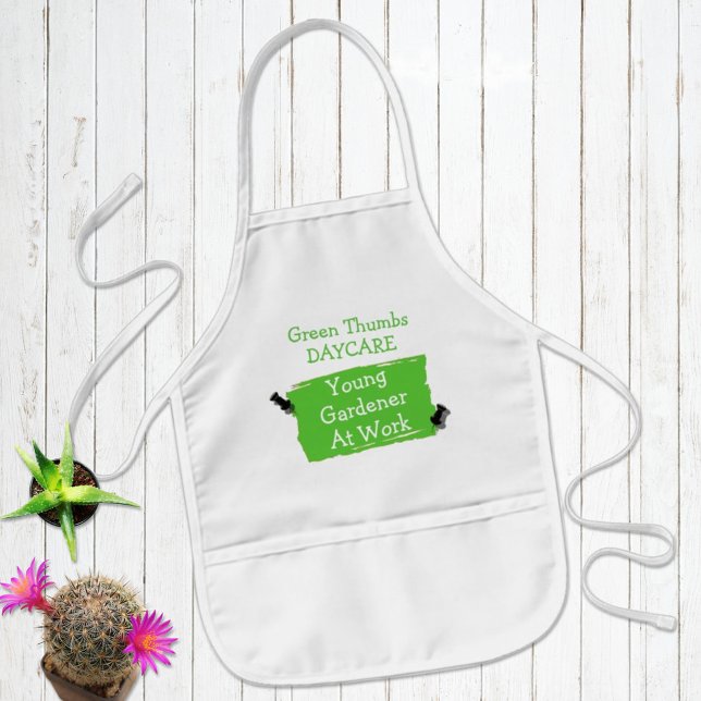 Custom Daycare Artist Green Scrap Paper Pins Art Kids' Apron (Try to keep the kids clothes clean with a fun personalized apron in one of three colors. )