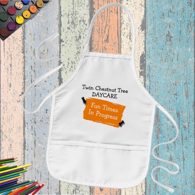 Custom Daycare Fun Orange Scrap Paper Pins Art Kids' Apron (Keep playtime clean. This apron is ready for personalization for a gift or a business accessory. )