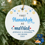 Custom FIRST MARRIED HANUKKAH Ceramic Ornament<br><div class="desc">Cute FIRST HANUKKAH MARRIED ceramic ornament with CUSTOMIZABLE NAMES & YEAR. Design shows Hanukkah blue handwriting script typography with blue and yellow hanging stars. Two red stars decorate the word 'married'. A beautiful souvenir for couples celebrating their first married Hanukkah. Design is repeated on the back. Hebrew version available separately....</div>